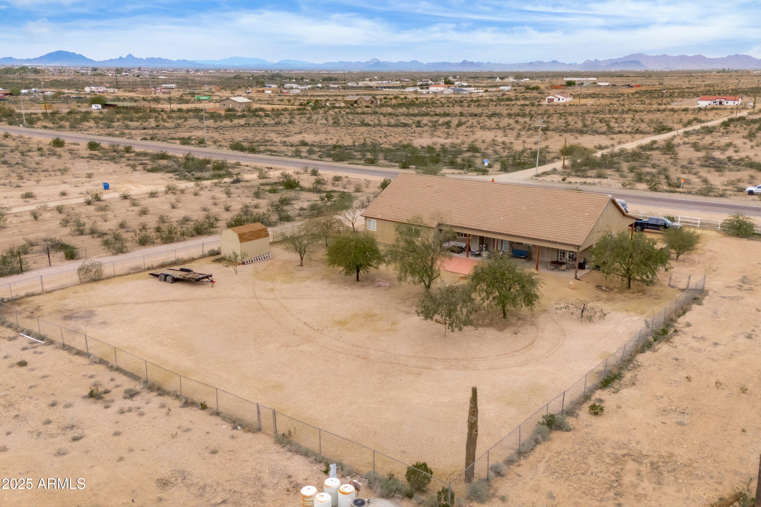 35947 West Buckeye Road Tonopah, AZ 85354 - Photo 53 of 54 an aerial view of residential houses with outdoor space