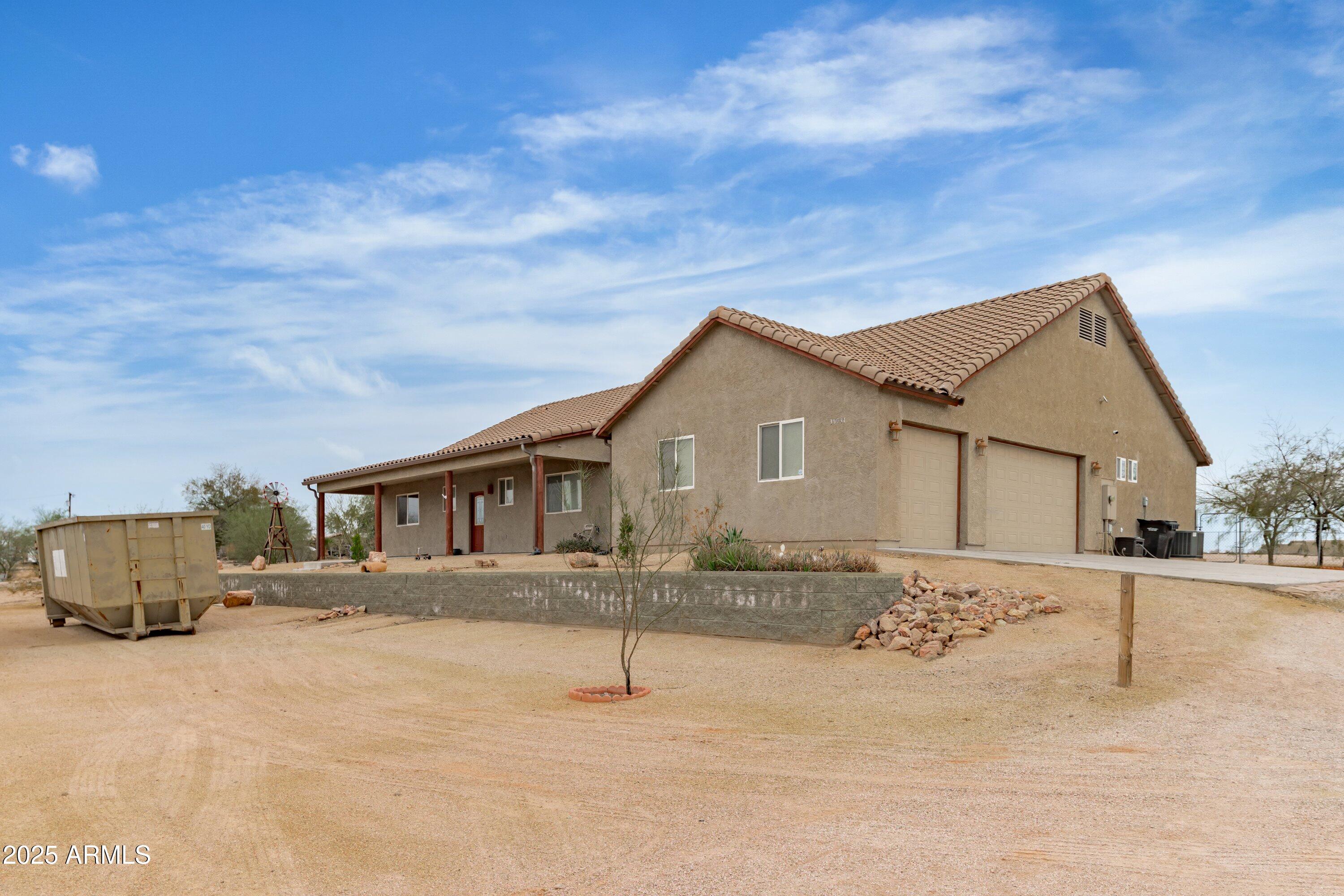 35947 West Buckeye Road Tonopah, AZ 85354 - Photo 7 of 54 a view of a house with a patio
