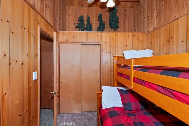 a roof deck with a table and chairs