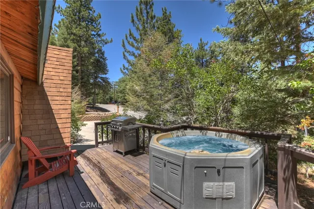 a view of balcony with wooden floor and outdoor space