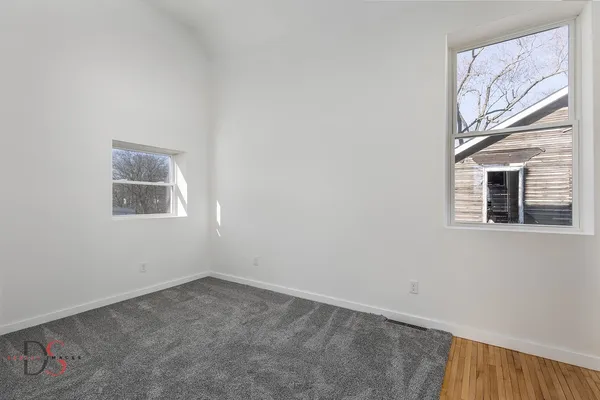 a view of a bathroom with a sink and a bathroom