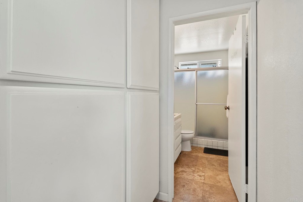 1104 Doomey Drive Ramona, CA 92065 - Photo 17 of 31 a view of a bathroom from a hallway