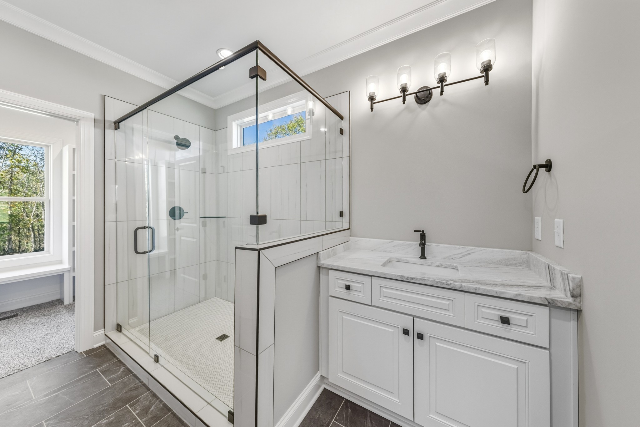 1675 Sulphur College Road Hartsville, TN 37074 - Photo 20 of 42 a bathroom with a granite countertop sink a mirror and shower