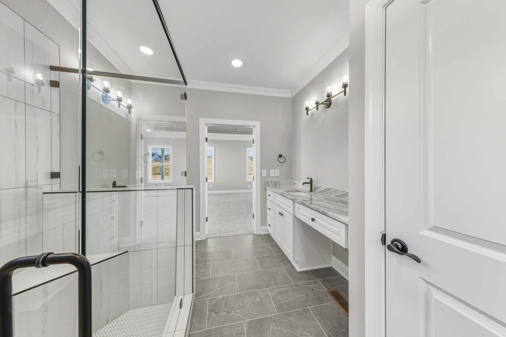 1675 Sulphur College Road Hartsville, TN 37074 - Photo 25 of 42 a bathroom with a granite countertop sink mirror and shower