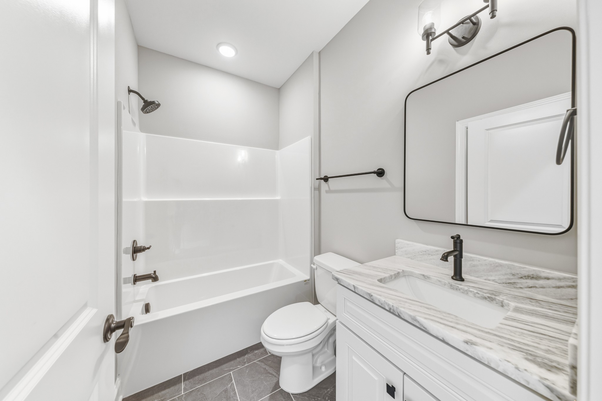 1675 Sulphur College Road Hartsville, TN 37074 - Photo 29 of 42 a bathroom with a sink toilet a vanity and shower