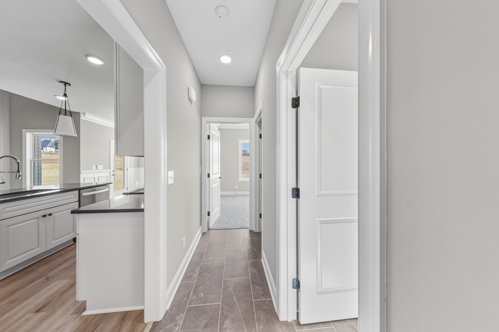 1675 Sulphur College Road Hartsville, TN 37074 - Photo 30 of 42 a view of a kitchen with a refrigerator and a sink