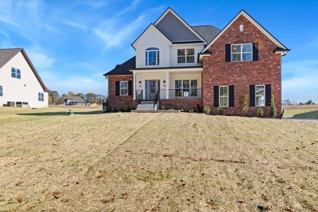1675 Sulphur College Road Hartsville, TN 37074 - Photo 40 of 42 a front view of a house with a yard