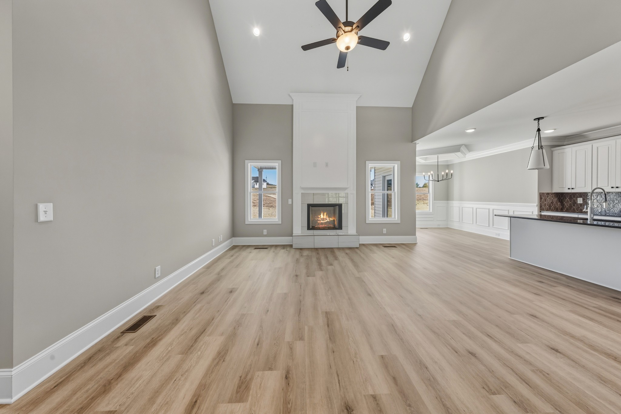 1675 Sulphur College Road Hartsville, TN 37074 - Photo 7 of 42 wooden floor in an empty room with a window