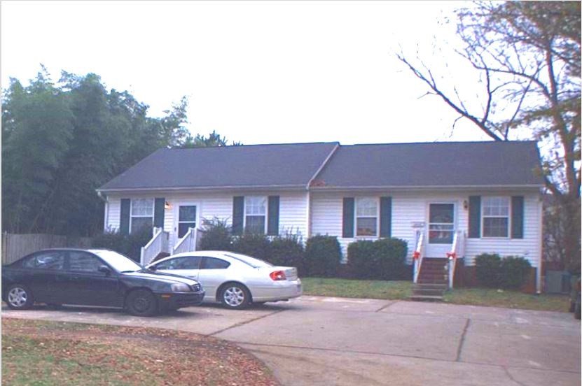 901 Marlborough Road Raleigh, NC 27610 - Photo 1 of 3 a front view of a house with parking space