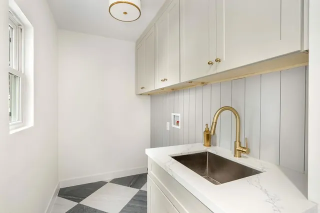 a view of backyard with deck and wooden floor