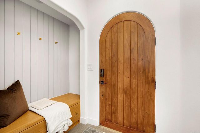 a bedroom with a bed and a closet