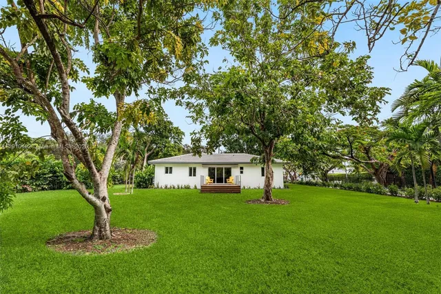 a house view with a garden space