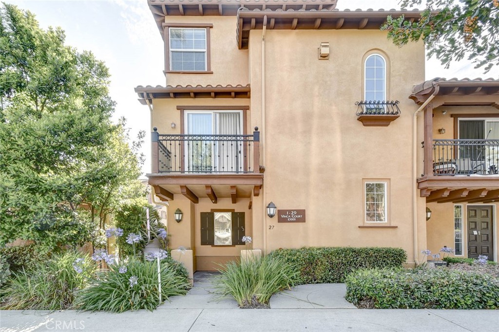 27 Vinca Court Ladera Ranch, CA 92694 - Photo 1 of 1 a front view of a house with barbeque oven and plants