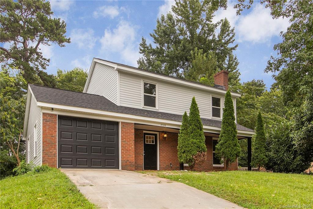 5720 Lawrence Orr Road Charlotte, NC 28212 - Photo 2 of 19 front view of a house with a yard