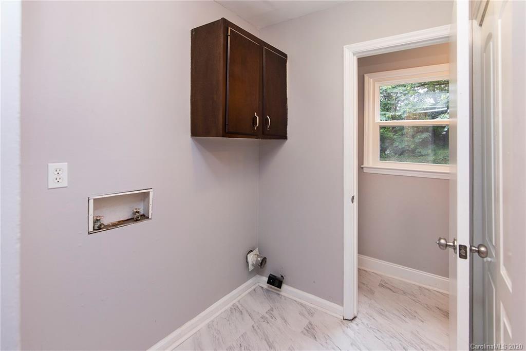 5720 Lawrence Orr Road Charlotte, NC 28212 - Photo 11 of 19 a room with window and a wooden floor