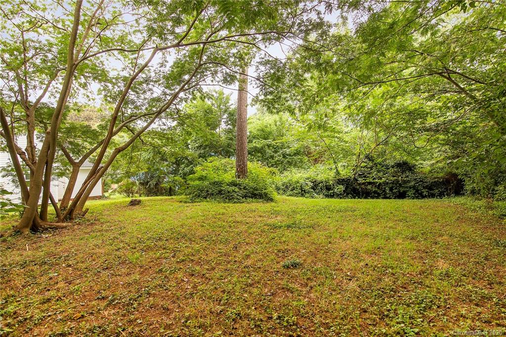 5720 Lawrence Orr Road Charlotte, NC 28212 - Photo 19 of 19 a view of a field with an trees