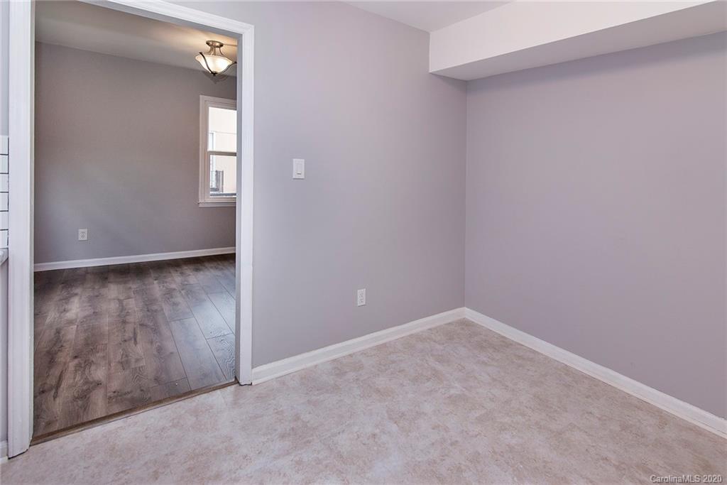 5720 Lawrence Orr Road Charlotte, NC 28212 - Photo 7 of 19 an empty room with windows & closet