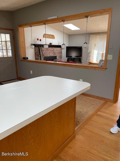 76 Louden Bethlehem Road Otis, MA 01253 - Photo 27 of 54 a kitchen with stainless steel appliances a sink and a microwave