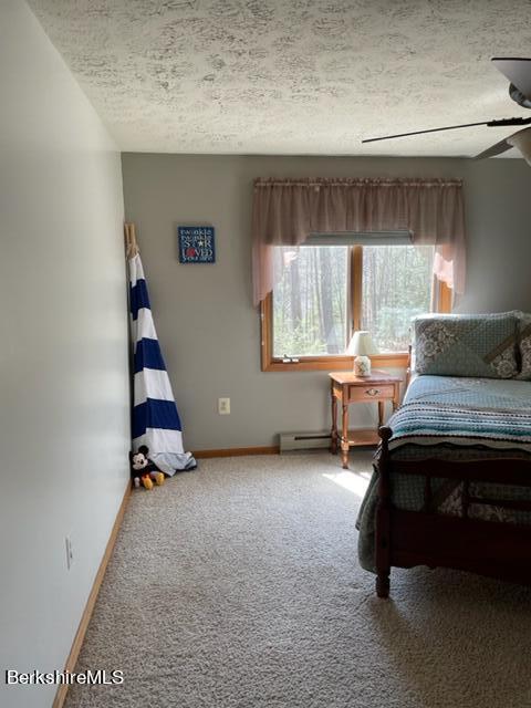 76 Louden Bethlehem Road Otis, MA 01253 - Photo 34 of 54 a living room with furniture and a window
