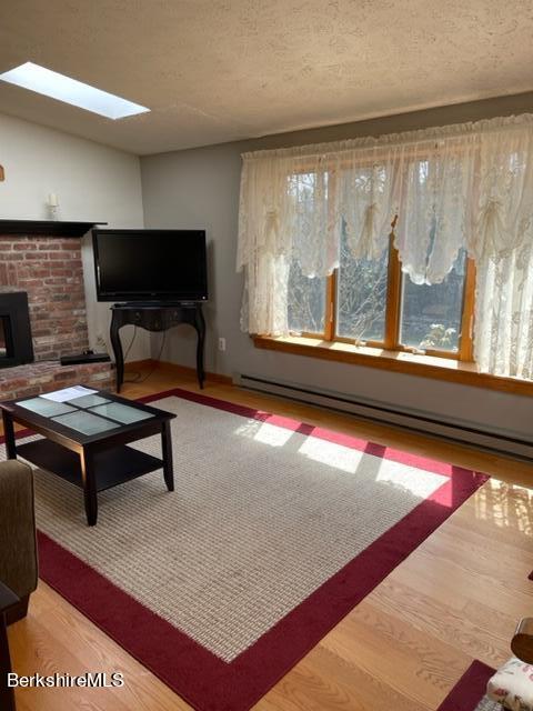 76 Louden Bethlehem Road Otis, MA 01253 - Photo 46 of 54 a living room with furniture and a rug