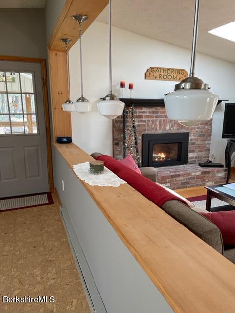 76 Louden Bethlehem Road Otis, MA 01253 - Photo 50 of 54 a living room with furniture and a fireplace