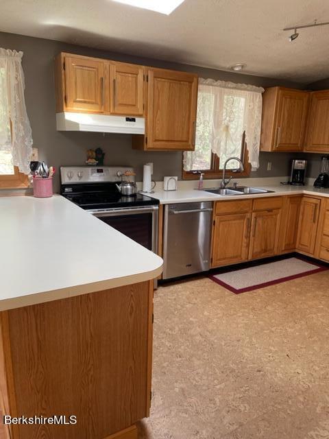 76 Louden Bethlehem Road Otis, MA 01253 - Photo 53 of 54 a kitchen with granite countertop a sink cabinets stainless steel appliances and a window