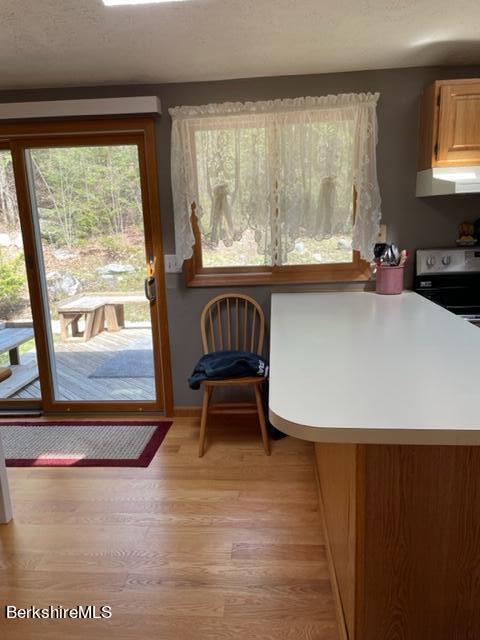 76 Louden Bethlehem Road Otis, MA 01253 - Photo 54 of 54 a living room with a window and a table