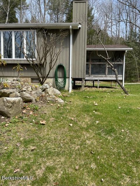 76 Louden Bethlehem Road Otis, MA 01253 - Photo 10 of 54 a view of backyard with wooden fence