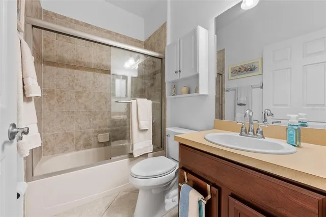 a bathroom with a sink a toilet and a bathtub