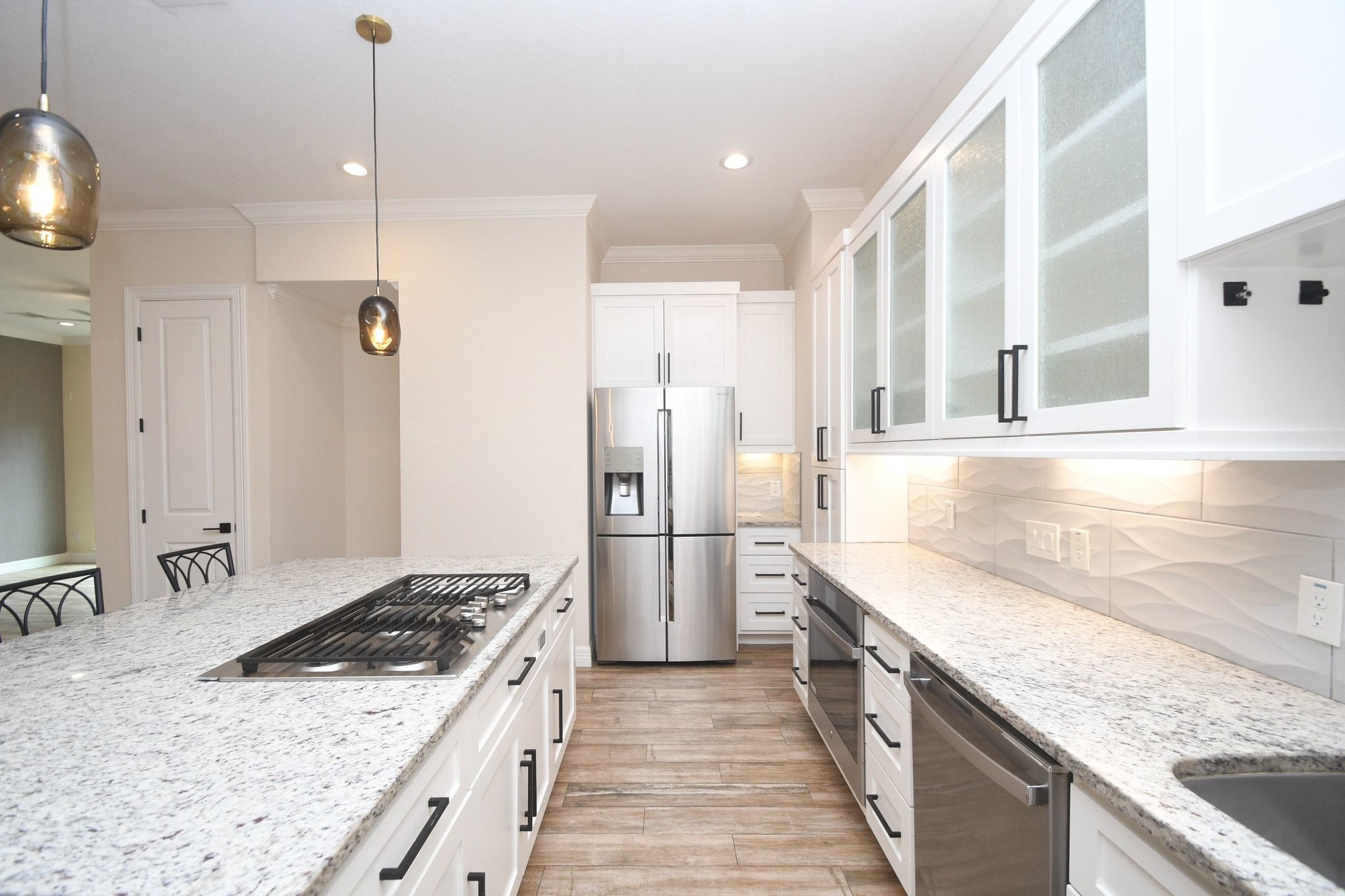 710 Stanford Street, Unit B Houston, TX 77019 - Photo 2 of 33 a kitchen with a stove sink and refrigerator