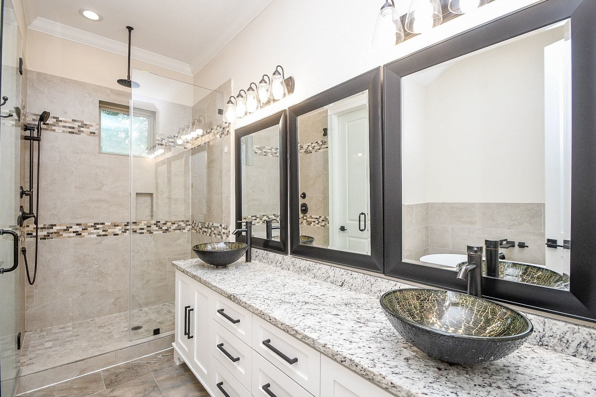 710 Stanford Street, Unit B Houston, TX 77019 - Photo 25 of 33 a bathroom with a granite countertop sink a mirror and shower
