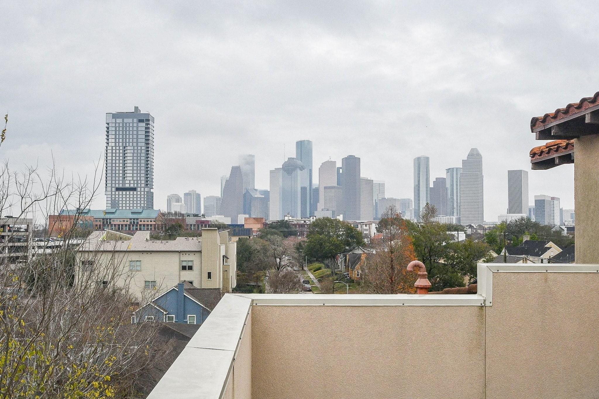 710 Stanford Street, Unit B Houston, TX 77019 - Photo 28 of 33 a view of a city with tall buildings