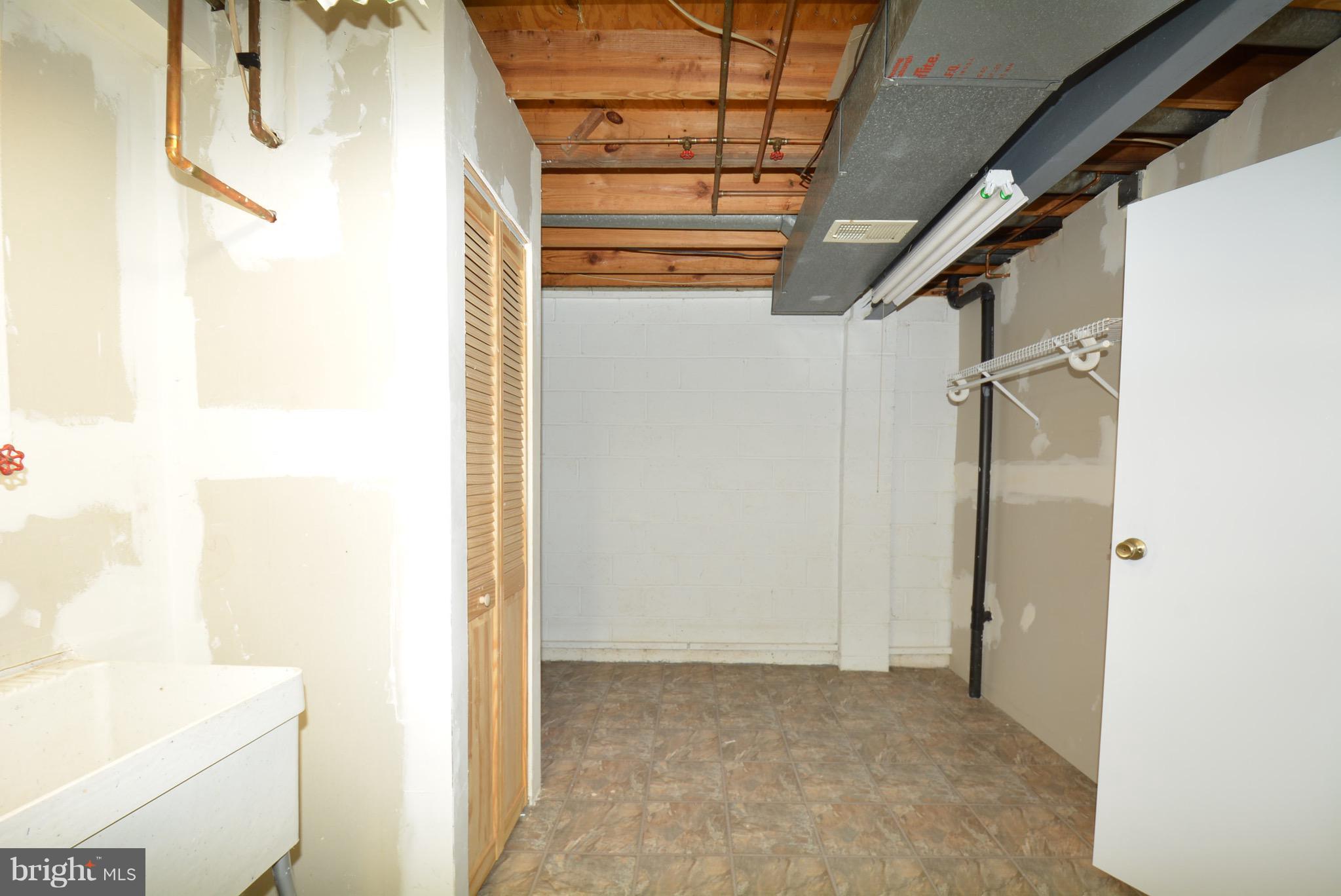 11555 Underoak Court Reston, VA 20191 - Photo 16 of 22 Room for Storage with Full Laundry Room