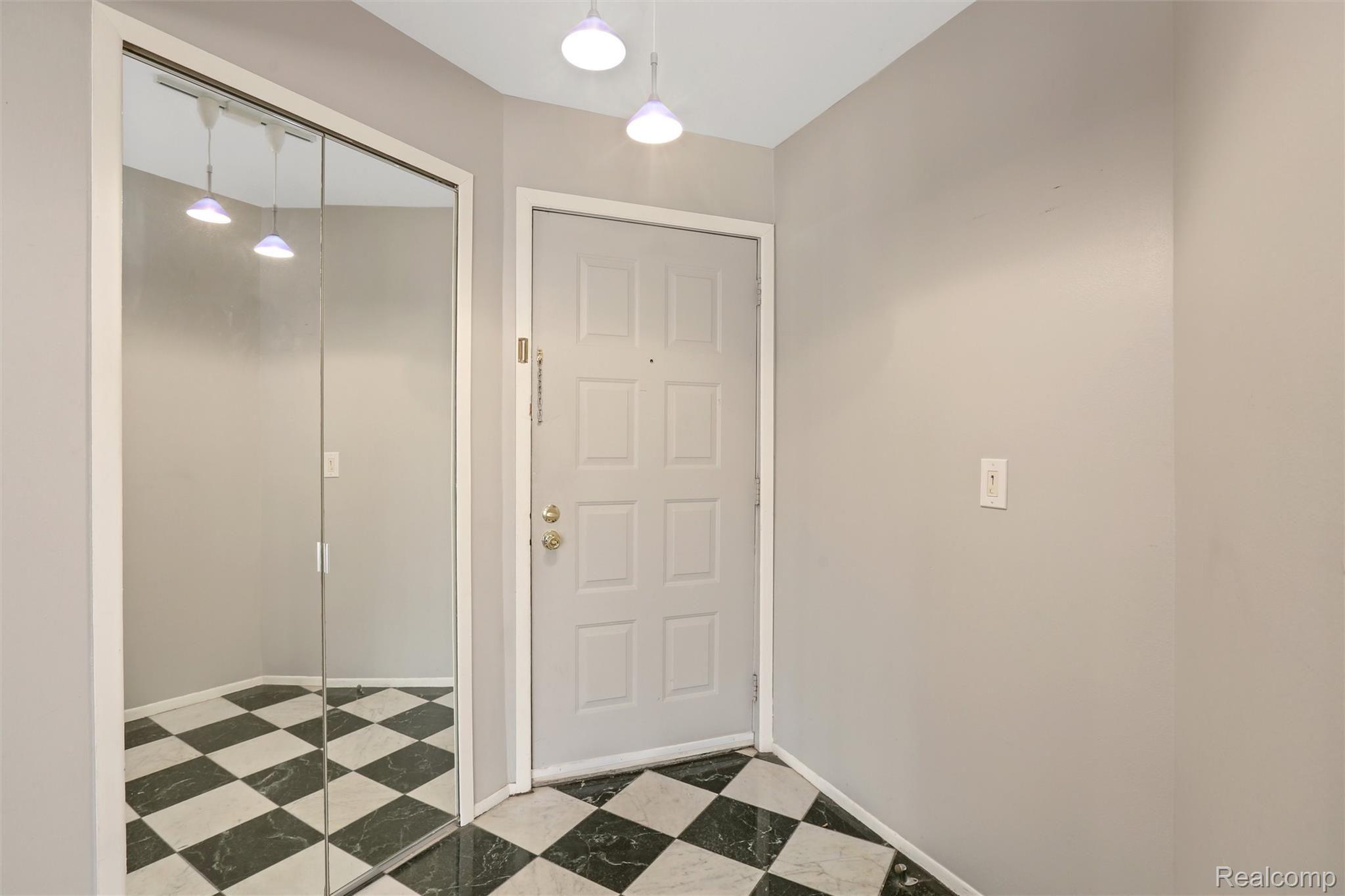 27374 Evergreen Road, Unit 4 Southfield, MI 48076 - Photo 19 of 26 27374 Evergreen Rd, Lathrup Village, MI 48076 Foyer with Enormous Coat Closet