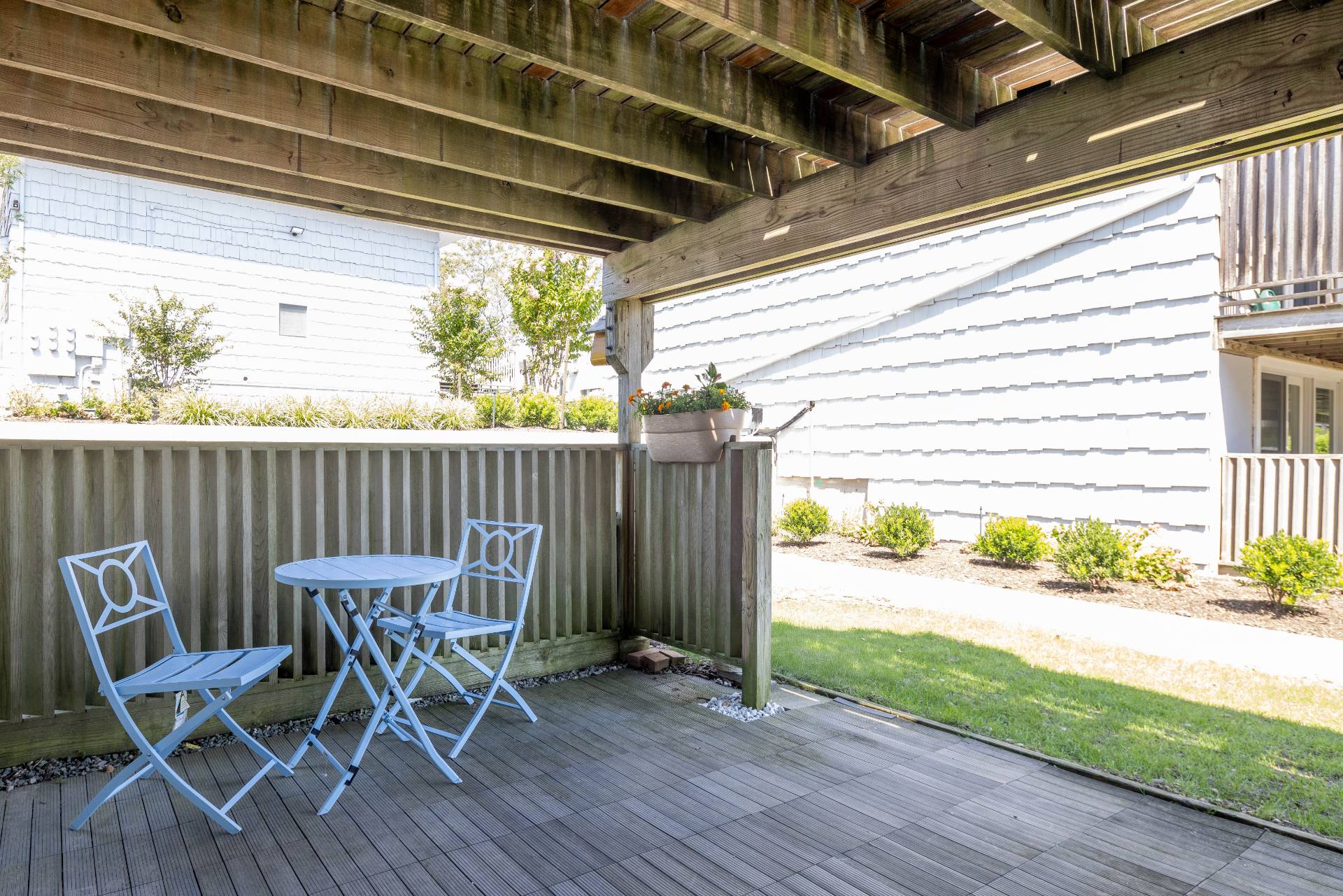 3045 Mitchell Road Westhampton Beach, NY 11978 - Photo 16 of 25 a view of chair and table in the patio