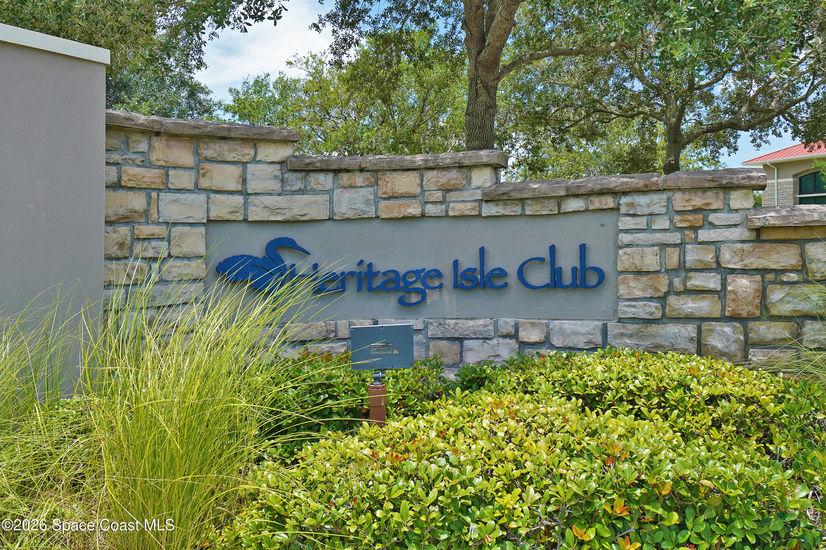 7170 Ralston Street Melbourne, FL 32940 - Photo 46 of 77 Heritage Isle Club Sign