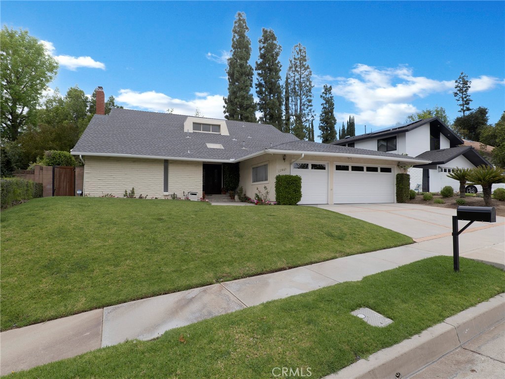 22649 Town Crier Road Calabasas, CA 91302 - Photo 2 of 47 a house that is sitting in the grass