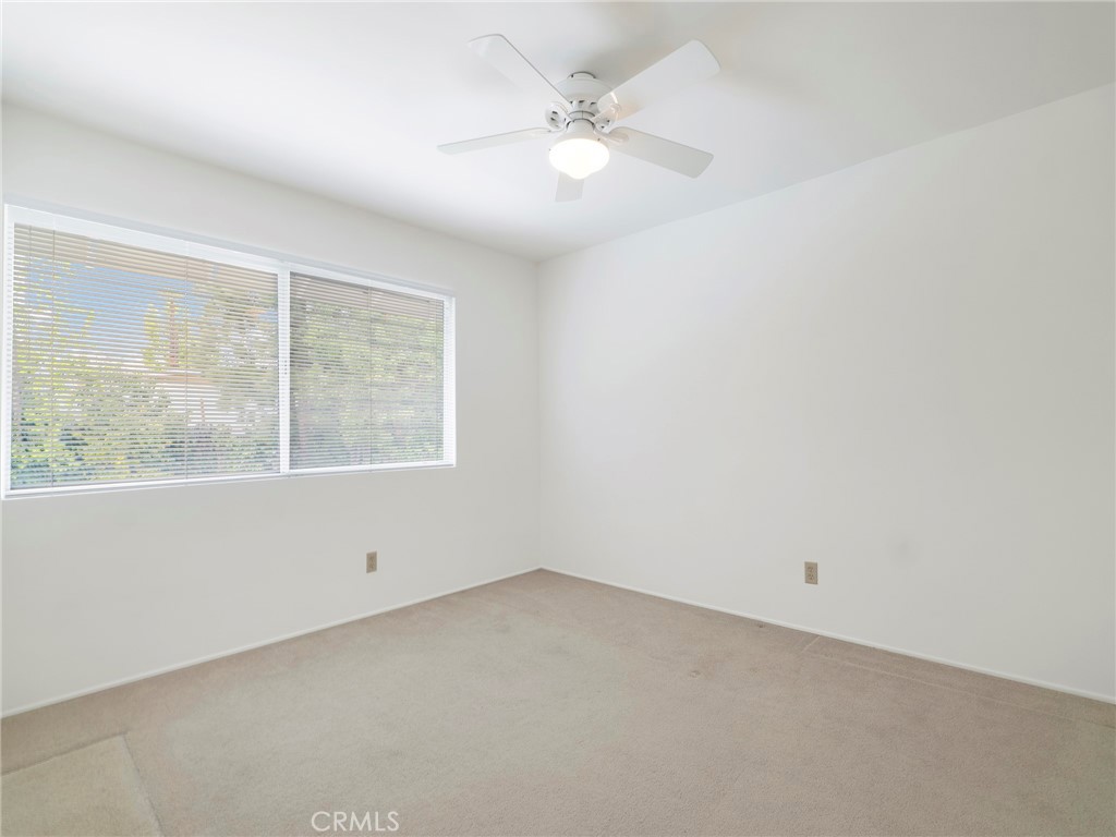 22649 Town Crier Road Calabasas, CA 91302 - Photo 30 of 47 an empty room with a window