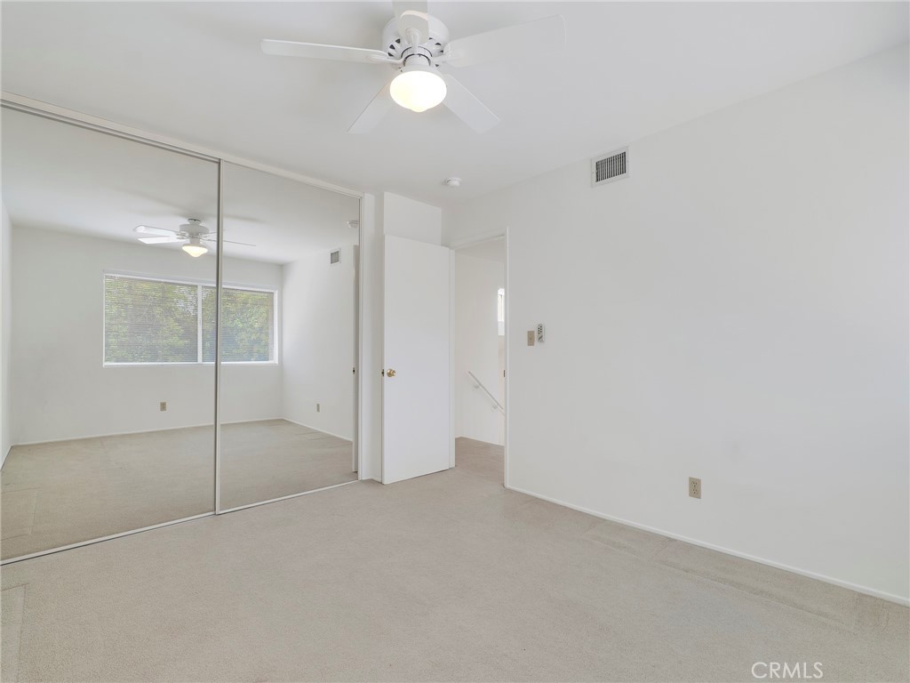 22649 Town Crier Road Calabasas, CA 91302 - Photo 31 of 47 a view of an empty room with a window