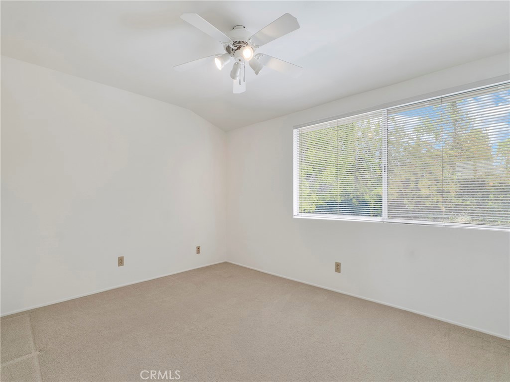 22649 Town Crier Road Calabasas, CA 91302 - Photo 34 of 47 an empty room with a window