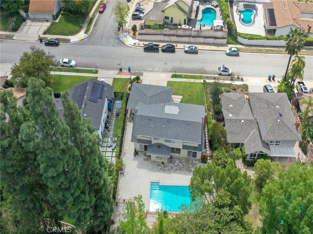 22649 Town Crier Road Calabasas, CA 91302 - Photo 44 of 47 an aerial view of a house with outdoor space swimming pool and outdoor seating