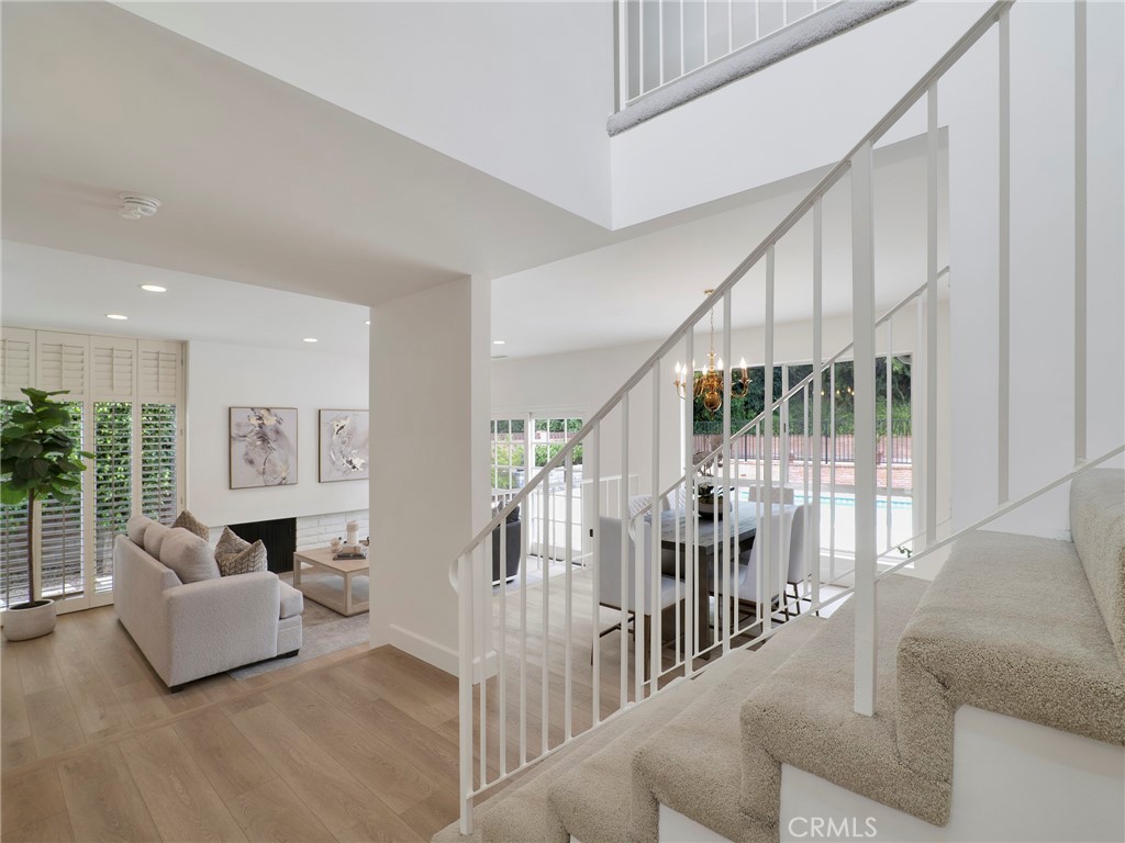 22649 Town Crier Road Calabasas, CA 91302 - Photo 10 of 47 a living room with furniture and a large window