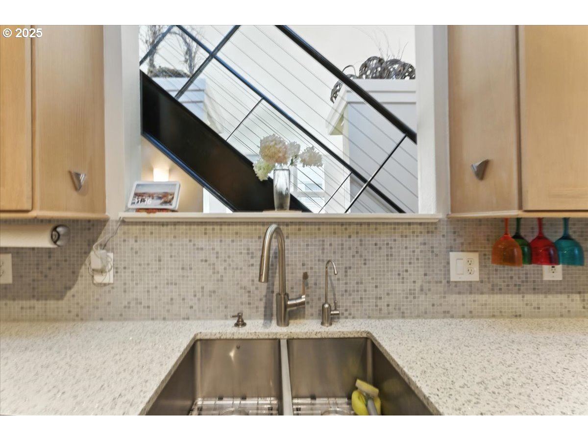 1443 Northeast Village Street Fairview, OR 97024 - Photo 12 of 37 a kitchen view with granite countertop a sink and a stove