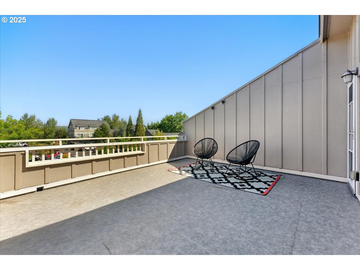 1443 Northeast Village Street Fairview, OR 97024 - Photo 15 of 37 a view of a balcony with chairs