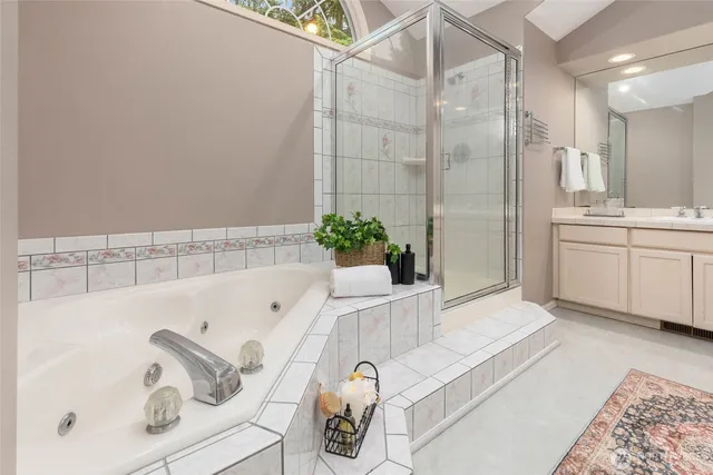 a bathroom with a bathtub and a sink