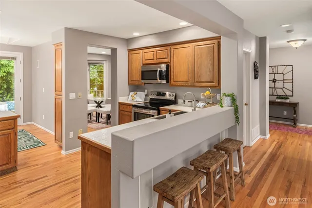 a room with furniture a flat screen tv and a large window