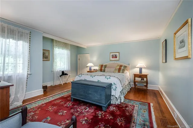 a bed room with a bed and a couch