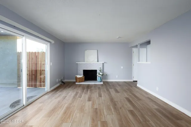 a kitchen with a sink a stove and cabinets