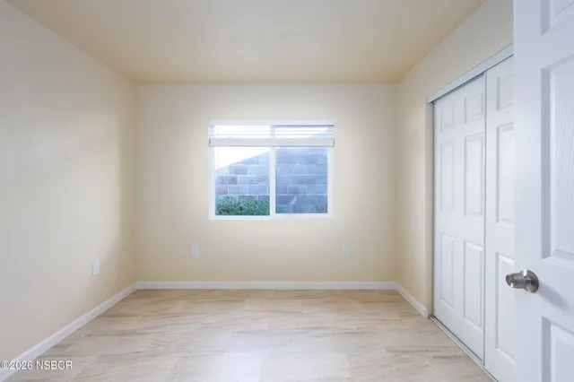 a view of a back yard of the house