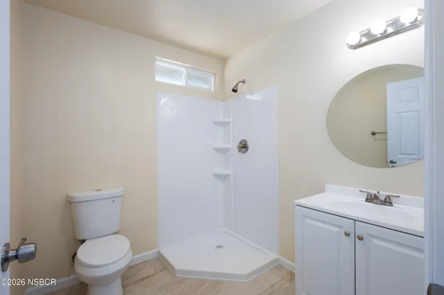 a picture of a park with a bench